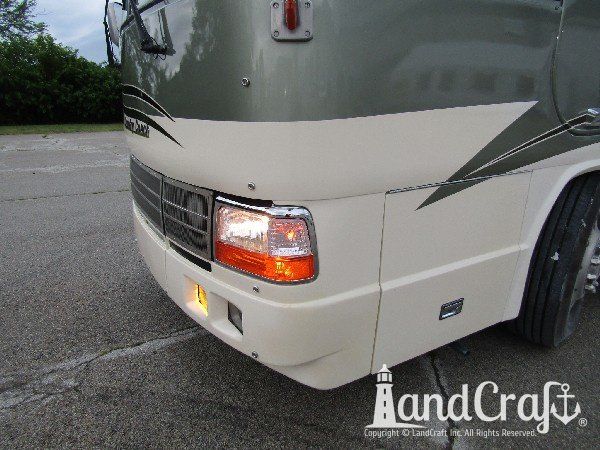 Country Coach motor coach with front end repaired and refinished