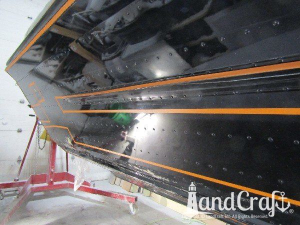 Picture of bottom scratch and dent damage on aluminum boat