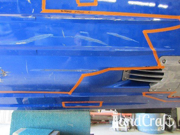 Yamaha waverunner with multiple areas of damage on the bottom hull