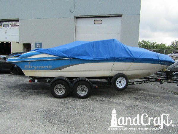 Accident damage along the side of a fiberglass Bryant boat
