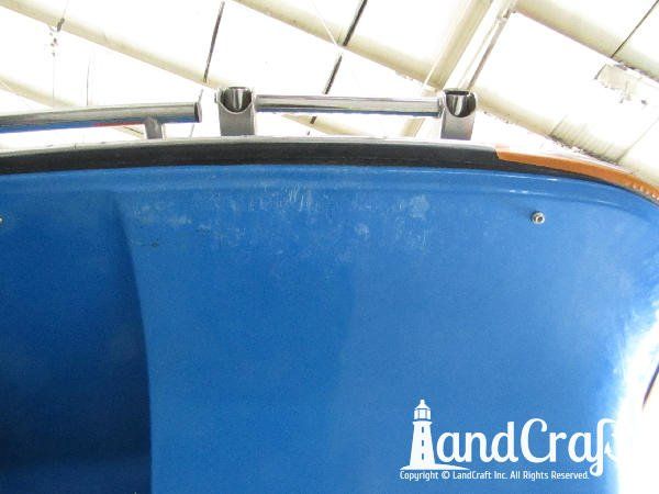 Fiberglass damage and gelcoat scratches in the repair process on a Bryant boat