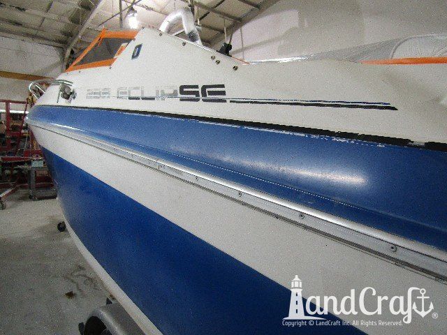 Wellcraft boat before exterior repairs and refinishing