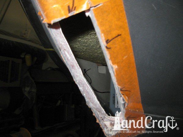 Repairing grounding damage on the hull of Nauticstar center console fiberglass boat