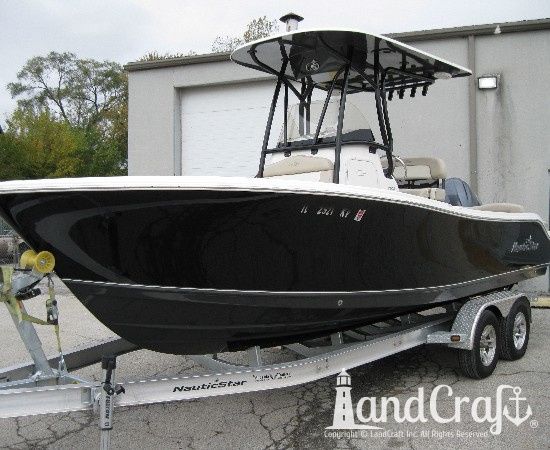 Completed fiberglass and gelcoat repairs on the hull of this Nauticstar center console fiberglass boat