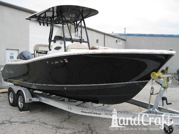 Completed fiberglass and gelcoat repairs on the hull of this Nauticstar center console fiberglass boat