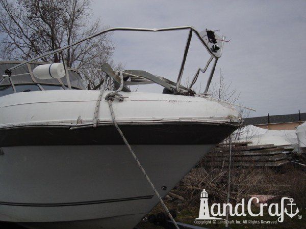Boat with rub rail and stainless railing damage from impact