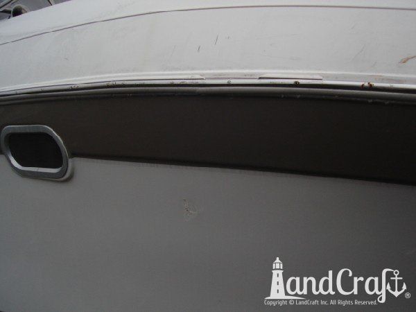 Boat with rub rail damage