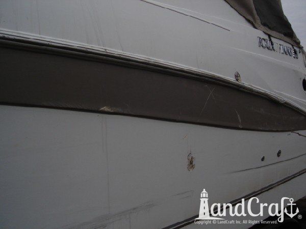 Boat with fiberglass structural and cosmetic damage