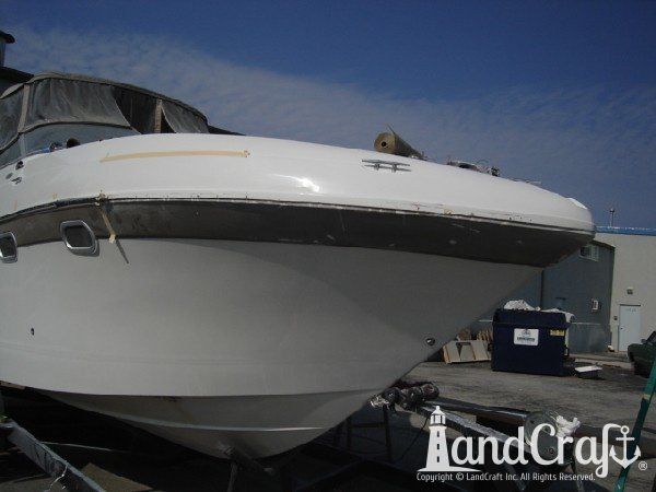 Boat with fiberglass structural and cosmetic damage in the repair process