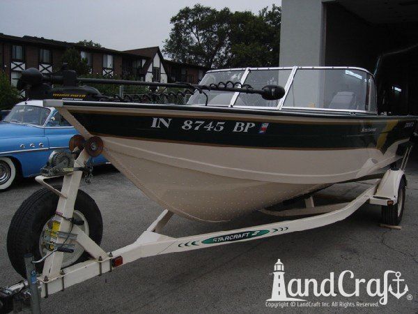 Aluminum Starcraft boat with side scratch damage