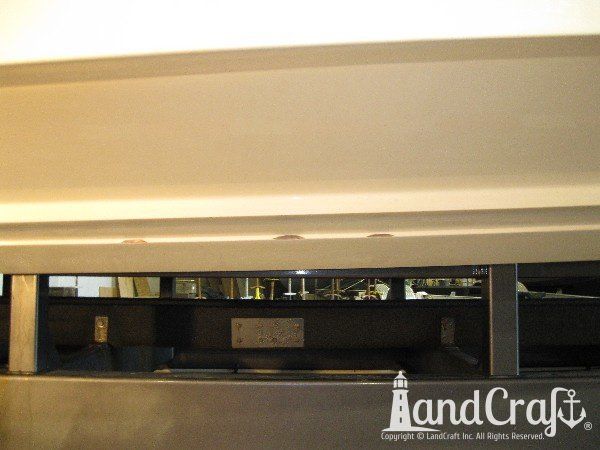 High performance catamaran boat getting an emergency gelcoat repair