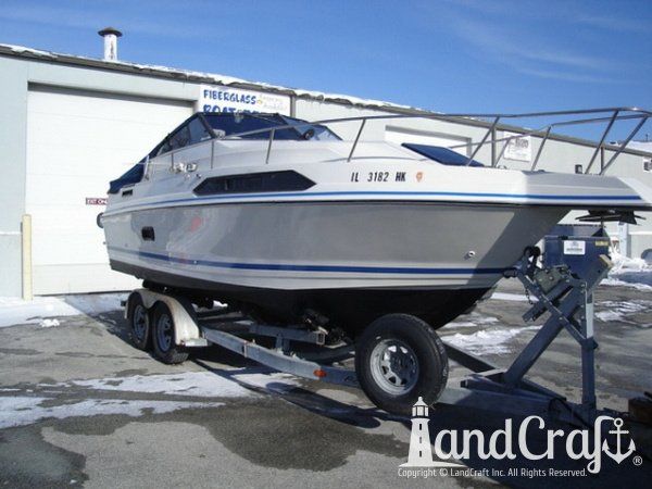 Boat with refurbished and glossy gelcoat and updated decal striping