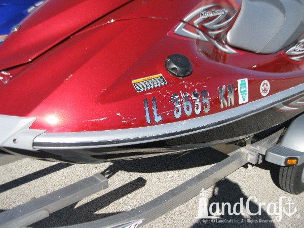 Red Yamaha with scrapes and scratches on front end
