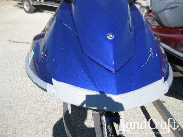 Blue Yamaha with scratches across the front