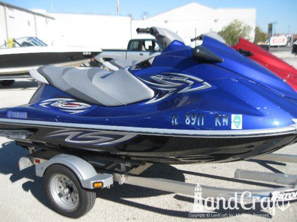 Blue Yamaha with scratches along the side