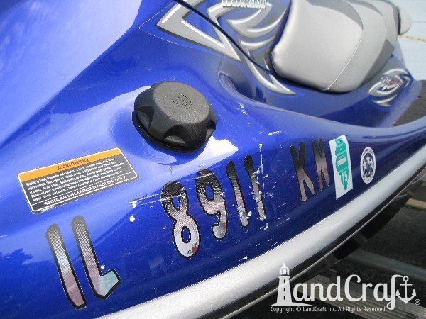 Blue Yamaha with scratches across the front side