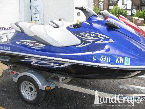 Blue Yamaha with scratches along the side