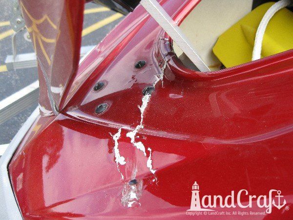 Red Yamaha with structural damage on front end