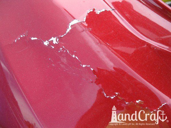 Red Yamaha with structural damage on front end