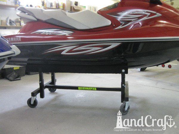 Red Yamaha waverunner on stand in the workshop for repair