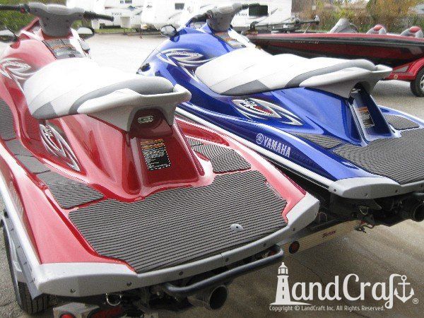 Red and Blue Yamaha waverunners completely repaired and refinished