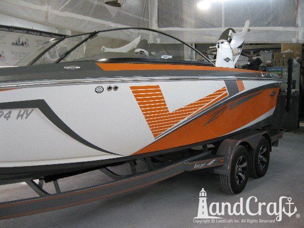 Repaired Tige wakeboard boat with new decal kit applied