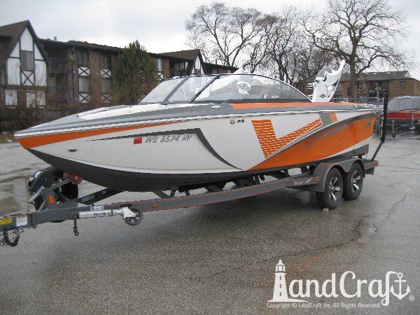 Repaired Tige wakeboard boat with new decal kit applied