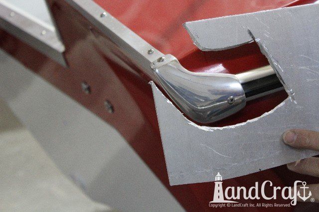Glastron boat gets custom metal work piece created by LandCraft to match existing piece