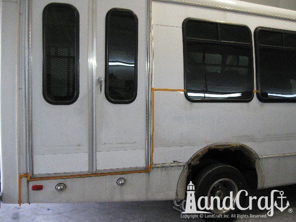 Fiberglass bus damage requiring repair and refinishing