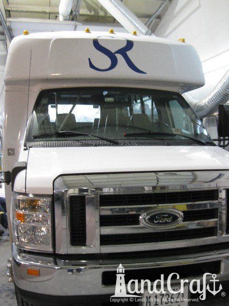 Fiberglass bus damage requiring repair and refinishing