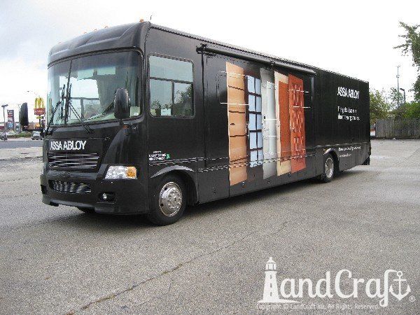 Emergency repair on an ad campaign motorcoach