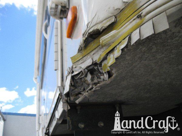 Structural aluminum and fiberglass RV damage