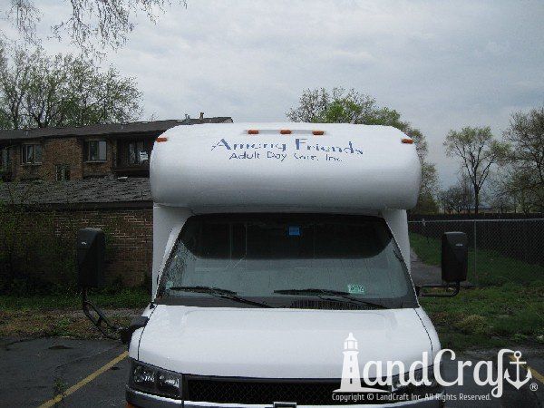 Completed fiberglass repair with refinishing on a commercial use bus
