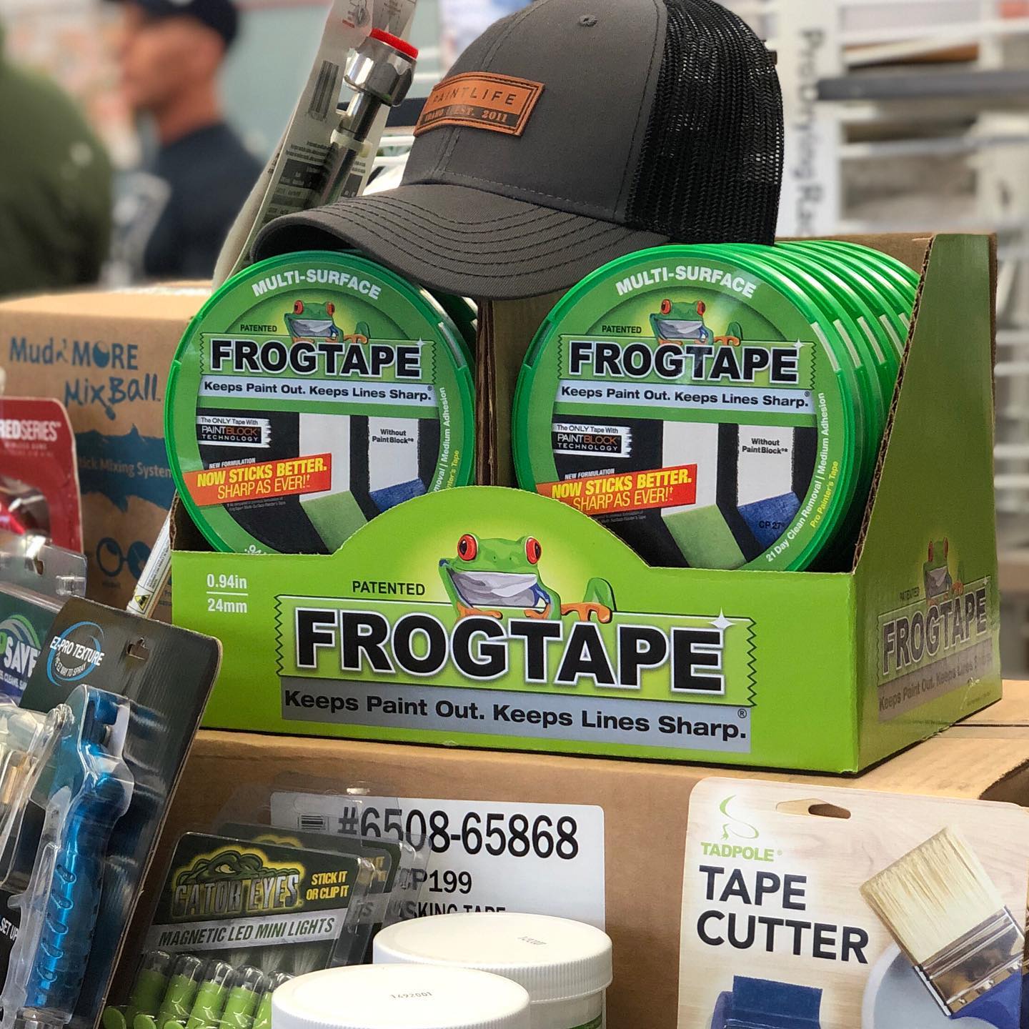 A box of frogtape is sitting on top of a table.