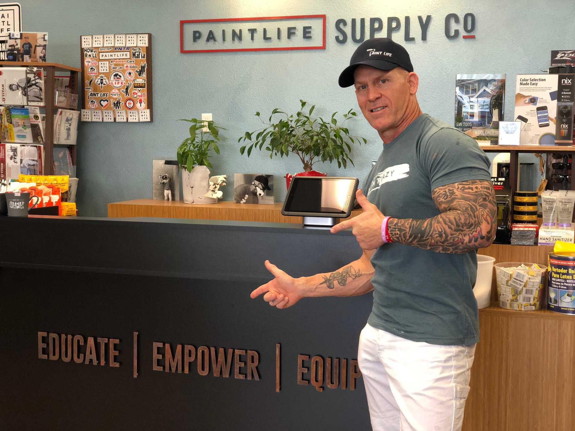 Idaho Painter at front desk of Paint Life Supply Co.