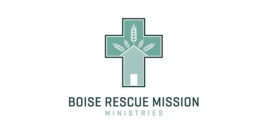 The logo for boise rescue mission ministries is a cross with wheat growing out of it.