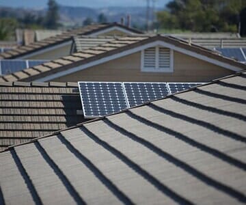Roofing Products — Roof with Solar Panel in Salt Lake City, UT Roofing Products — Roof with Solar Panel in Salt Lake City, UT