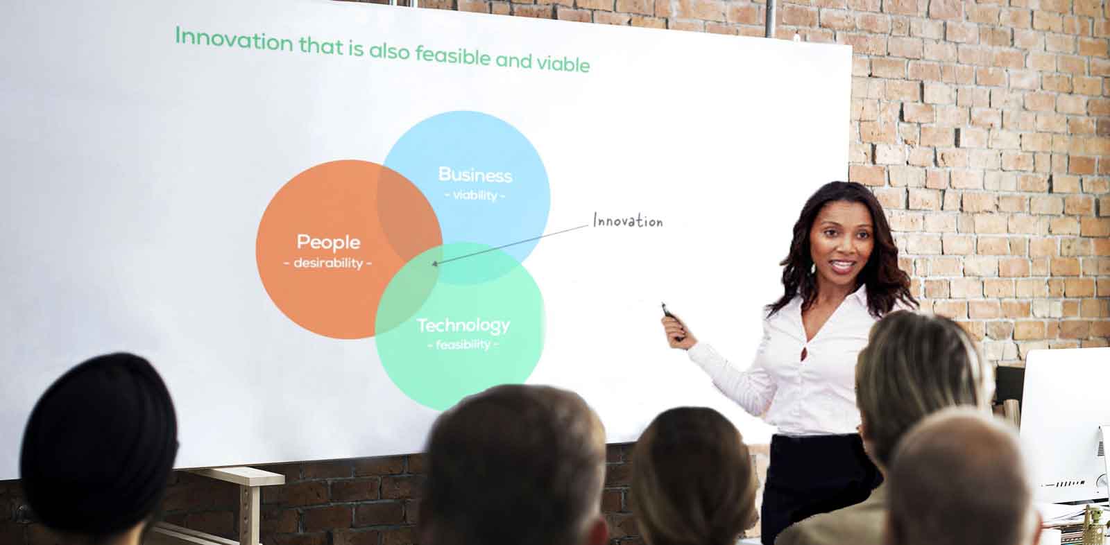 Conference room in a modern office space with a drawing of the