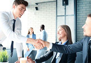 Job applicant having interview. Handshake while job interviewing