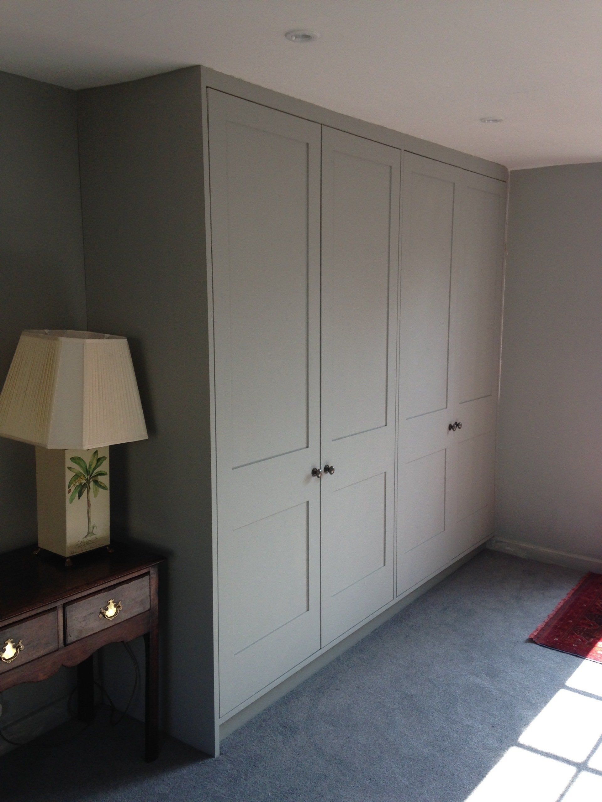 Grey painted shaker doors and wardrobe.