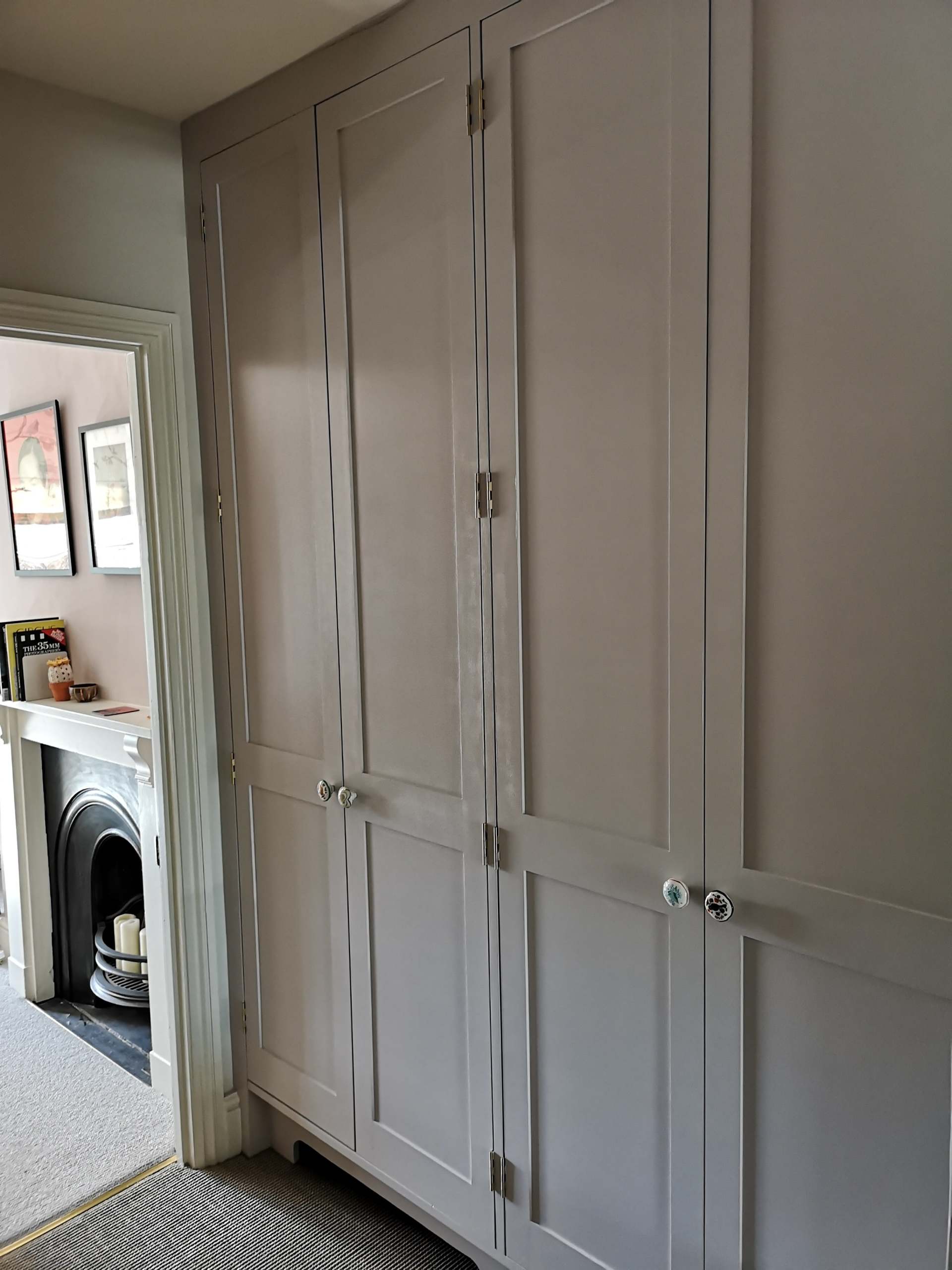 Large shaker wardrobe hand painted with traditional hinges.