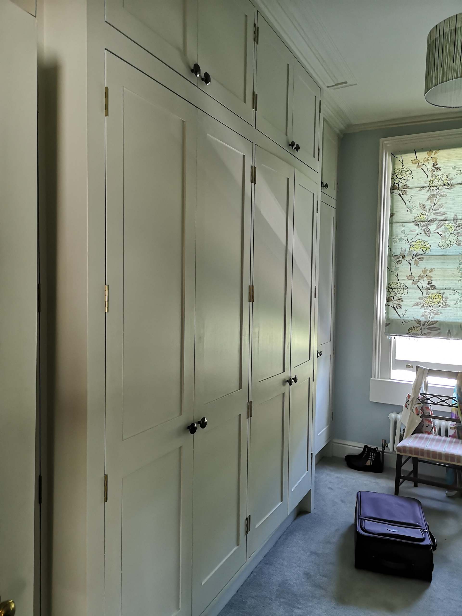 Large shaker wardrobe hand painted with traditional hinges.