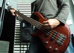 A man playing an electric guitar
