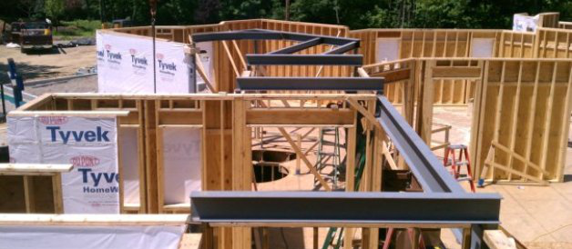 Man installing a steal beam