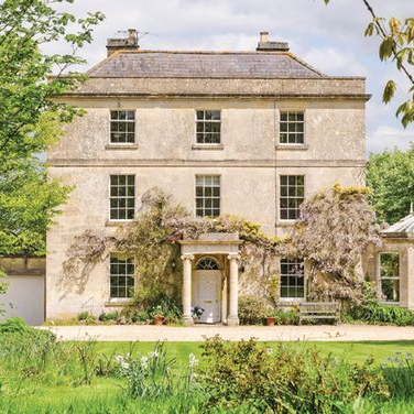 Elegant cotswold stone house with wysteria outside,Cotswold Tiger, The Second Home Company 