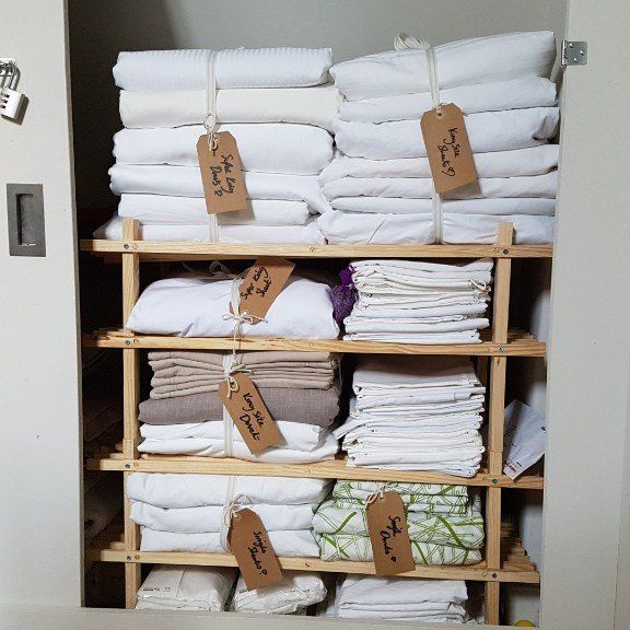 freshly pressed towels and linen, Cotswold Tiger, The Second Home Company