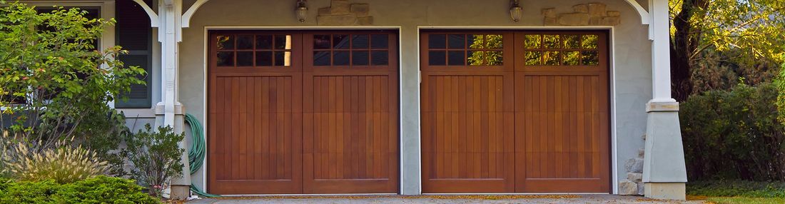 Garage Doors — Wooden Car Garage in Springfield, MO Garage Doors — Wooden Car Garage in Springfield, MO