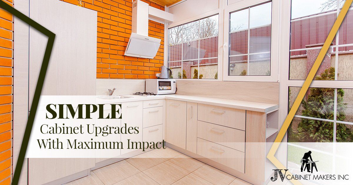 A kitchen with a lot of cabinets and a lot of windows.