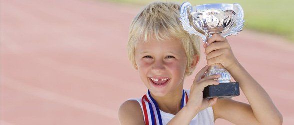 boy-with-trophy