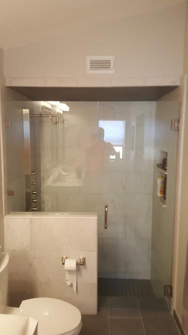 FRAMELESS DOOR AND PANEL ON KNEE WALL 022817 — Glass and Mirror in Tarpon Springs, FL